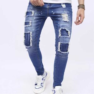 Jeans masculinos Homens elegantes buracos Sparkle Ink Jeans estampados de jeans calças de lápis magras de estilo strt masculino y240507