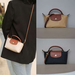 Best Selling Crossbody Bag New 85% Factory Promotion Inlaid Mini Womens Bag Single Handle Nylon Dumpling Handheld Environmental Protection Fashion Phone Bag