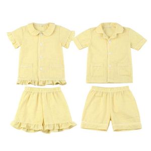 Pyjamas Baby Pyjamas Summer Clothing Gilrs Matchande Solid Color Pyjamas Seersucker Soft Cotton Sybling Set för pojkar och flickor Pyjamas Setl2405