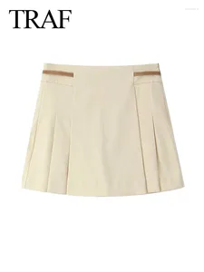 Kvinnors shorts 2024 Kvinna vintage bälte dekoration smal mini kvinnor chic solid sido blixtlås veckad kjol streetwear