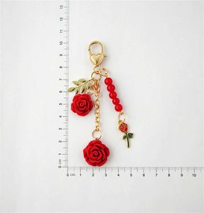 Keychains Lanyards Vintage Camellia Rose Keychain Exquisite Golden Love Keyring Pearl Leaf Charm For Bag USB Drive Accessory Pendant Party Gift