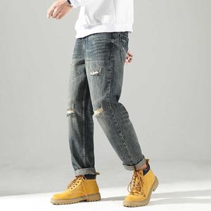 Löst mäns byxor Autumn Distraed Patch Jeans Mens avsmalnande High Street American Overized High-End Harlan