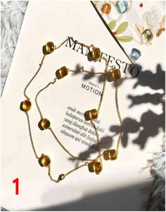 Mode fyra bladklöver guldblå ​​mässing tio blommor hänge halsband för kvinnor älskare dag gåva klassisk designer märke smycken för2363892