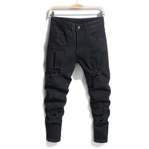 Jeans maschili eleganti uomini strappati a matita pantaloni per jeans a filo hip hop in stile cotone cotone pantaloni di jeans magri y240507