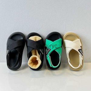 Сандалии корейская версия Childrens Sandals 2024 Летние новые девочки пляжная обувь для мальчиков мягкая подляжная девочка тренд H240507