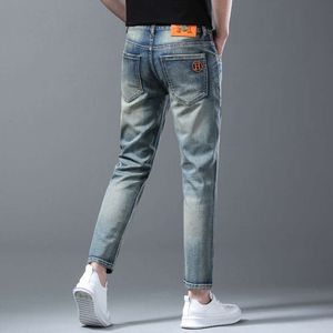 Fashion clothing 2024 Spring/Summer Nine point Jeans for Men's Versatile Slim Fit, Elastic Breathable, Fashionable Brand Washed Blue High end mens jeans designs