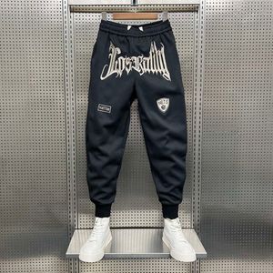 Mens Joggers Pants Autumn Fashion varumärke brev broderade avslappnade herrar täta sport mångsidiga elastiska vakt liten fot jogga