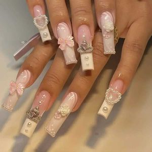 Falska naglar 24st vita franska falska naglar Lång balett falsk nagel med pärla båge design press på naglar bärbara fyrkantiga naglar set t240507