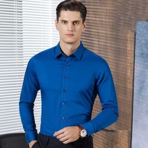 Herrklänningsskjortor 6xl 7xl 8xl 2023 Spring och Autumn New Solid Elastic Non Wrinkle Resistant Bamboo Fiber Slim Fit Shirt Mens Long SLE D240507