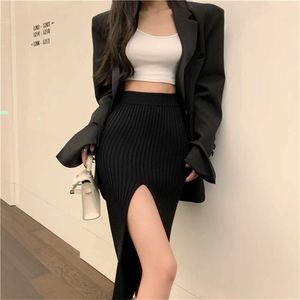 Kjolar elegant smal passform hög midja kjolar kvinnliga rent heta koreanska modeflicka stickad kjol sexig delad bodycon lång kjol för kvinnor