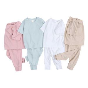 Kläderuppsättningar Essential Kids Boys Tracksuit Baby Girls Kläder Barn Sätt vanlig topptröja+byxor Sportuits för tonåringar kostymer H240507