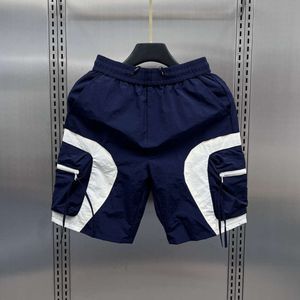 Сопоставление цвета рабочей одежды для быстрой сушки для мужских летних повседневных универсальных спортивных штанов, молодежные модные пляжные шорты