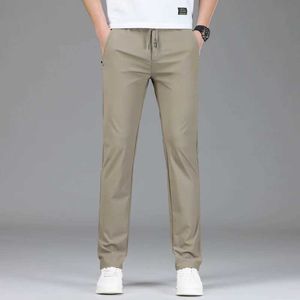 남자 바지 새로운 남성 패션 캐주얼 봄/여름 얇은 고급 사업 세트 느슨한 스트레이트 코튼 바지 J240507