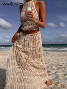 Tvådelad klänning sexig grimma långa kjolar set kvinnor vita s genom skörd topp hög midje kjol kvinnlig kostym 2024 sping sommar strand lady set t240507