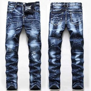 Mäns jeans polerade vita lapp jeans denim herr elastiska whiskers tvättade små hiphopbyxor fyra säsonger plus size j240507