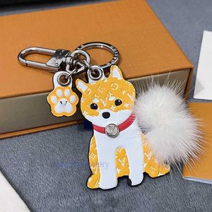 Keychains Lanyards Söt Yellow Dog Model Keychain Designer Key Chains Keyring Holder Brand Designers Keychains For Holiday Gift Men Women Car Bag Pendan