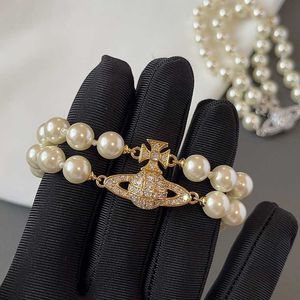 Designer VW Double Layered Pearl Saturn Magnetic Buckle Armband Womens Classic Full Diamond