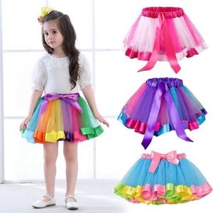Tutu klänning Rainbow Mesh Tulle kjolar barns elastiska midje kjolar söta skiktade fluffiga kakor fluffig tutu kjol för festivalfestdekor D240507