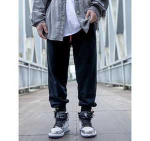 Calças de joggers masculinos calças casuais calças unissex de hiphop moda listras listras de lápis panneldes calças de corredor de lápis asiático 2U9L9861341