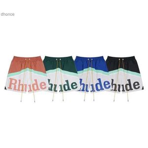 Herr- och kvinnors trender Designer Fashion Trendy Rhude Color Block Letter Casual Sports Mesh Shorts For Men Women High Street Elastic Beach Pants