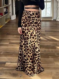 Юбки ретро женские леопардовые узоры атласная кожа 2024 Модная женская сладкая высокая талия Ультра -тонкие женские мод