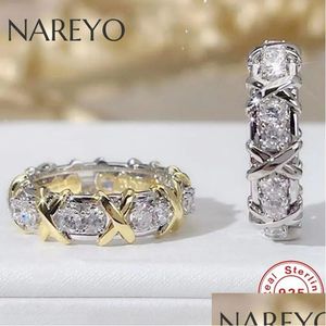 Solitaire Ring Luxury 925 Sterling Sier sammanflätad med AAA Zircon Crystal för en Womans Engagement Smyckesgåva 2 Färgval Drop D DHDBW