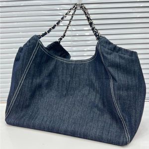 Francês de bolsas de uma ombro de um ombro de um ombro Denim Denim Toces de lona ao ar livre Metal Azul acolchoado 56cm Grande designer clássico Luxury GDFF