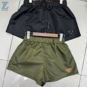 Calças femininas de lazer primavera/verão shorts elásticos versáteis para mulheres