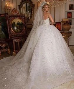 2024 Luxury Puffy African Wedding Dress Sheer Neck Short Sleeves Crystal Beads Appliqued Lace Women Bridal Gowns Court Train Vestido De Novia