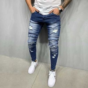 Mäns jeans Mens Hip-Hop Splice Hole Blue Bicycle Tight Montering Jeans Högkvalitativ Mens Street Style Style Cotton Elastic Denim Pants J240507