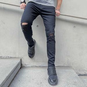 Herren Jeans Neue Männer Hip Hop Style Ripped Skinny Jeans Männer stilvolle schlanke Löcher Bleistift Jeanshose Y240507