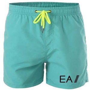 Mäns shorts 2024 Mens Low-Rise Breatable Beach Shorts Sexiga surfstammar Herr Mens Casual Boxer Sweatpants Summer Drawstring Shorts S-4XL Y240507