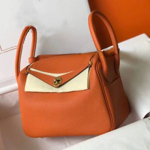 Modedesigner väska blixtlåsficka flerfärgad kvinnors tote messenger väska läder elegant kvinnors axel kors Her002