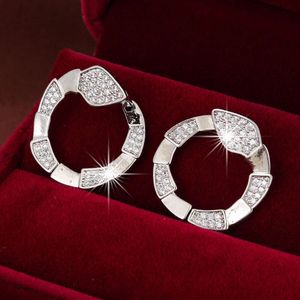 Designer Schmuck Charme Personalisiertes und trendiges Design mit Kupfer eingelegtes Zirkon Schlangenformular Damen Ohrschnalle Valentinstag Geschenkvalentinstag Geschenk