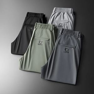 Homens de verão de tecido de seda de gelo macio masculino fino calças casuais coreanstyle moda straight high Strether calças de luxo masculino 240428