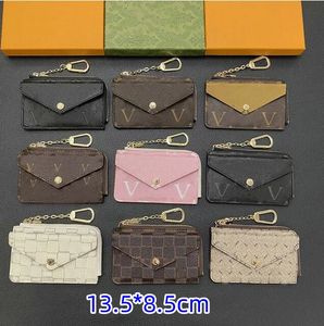 Kvinnors nyckelmynt Purse Mens Wallet Black Flower Poke Card Holder Keychain äkta läderdesigner Small Zippy Wallet Coin Purses