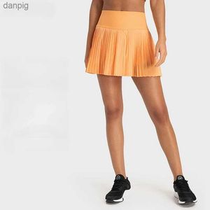 Spódnice nowe sportowe plisowane eleganckie spódnice tenisowe wysokiej karty brzusznej kieszenie boczne anty-pusty sportowe sukienki tenisowe Y240508