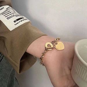 Chain High grade heart-shaped jewelry with stainless steel heart OT buckle T family bracelet womens non fading peach Q2405071