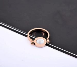 ROTAÇÃO DO GOLD ROSE DE HIGALIDADE com pedras laterais Rings Fashion Lady Creative Flip Ring Envie Box Original Box9011463