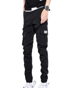 Men039s byxor män sidofickor last harem fast färg plysch lös alla matchar studenter byxor mode casual streetwear6428522