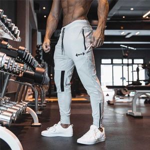 Men's Jeans 2023 New Mens Sports Pants Gym Fitness Sports Pants Fitness Athlete Sports Pants Mens Zipper Pocket Cotton Pencil Pants J240507