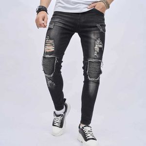 Jeans masculinos jeans masculinos rasgaram patch de motocicleta de motocicleta de jeans skinny calças masculinas de jeans de jeans elegantes calças de jeans casuais y240507