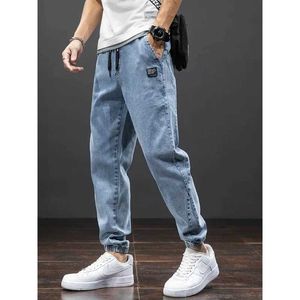 Męskie spodnie Summer Summer Black Blue Cargo Dżinsy męskie Ubranie jeansowe spodnie do joggingu Męskie odzież workowate harem dżinsy Plus rozmiary 6xl 7xl 8xl J240507