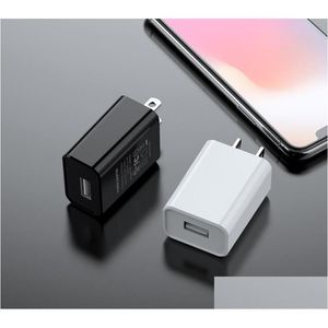 Caricabatterie per cellulari FCC Certificato US Plug 5V 1A 2A USB Caricatore veloce da viaggio Adattatore mobile Mobile per la consegna bianca Pho Otqzy