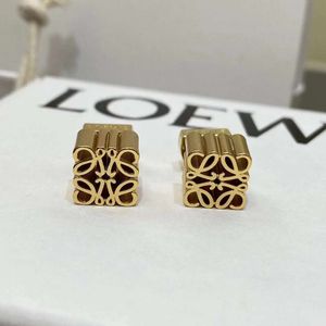 Designer Schmuck Charme Knopf Ohrringe Frauen geschnitzte Gold Anhänger Luowei Ohrringe Armband Diamant Net rot gleicher Stil