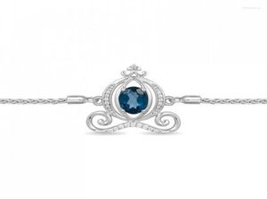 Charmarmband Heshi Enchanted Oval Blue Topaz och Diamond Carriage Bolo Armband in- 9.5 