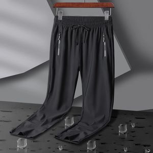 Summer Elastic Men Bieganie Spodną Spodnie Ice jedwabne jogging cienki spodnie dresowe swobodny trening na świeżym powietrzu spodni khaki czarny 240428