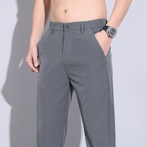 Marka odzież wiosna lato zwykli mężczyźni Ultra cienkie lodowe jedwabne chłodne spodnie elastyczne talia szara prosta biznes męskie spodnie 240428