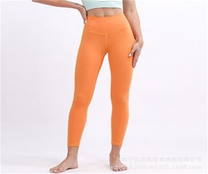 31 Yoga Leggings för kvinnor mycket elastiskt flexibelt tyg som kör lätt känsla träning fitness slitage lady tights fasta color2011771