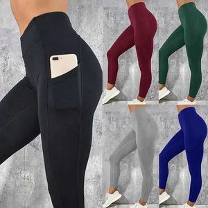 Kobiety legginsów Kobiety Sport Leggingi Gym Kieszonkowe spodnie Fitness Polejenie Etykiet Sportswear plus wielkość spodni siłowni dla kobiet Y240508